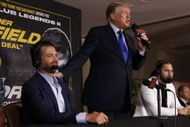 Donald Trump Jr. with his father (Image via Getty)
